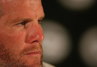 GREEN BAY, WI - MARCH 06: Quarterback Brett Favre of the Green Bay Packers listens to a question at his retirement press conference on March 6, 2008 at Lambeau Field in Green Bay, Wisconsin. (Photo by Jonathan Daniel/Getty Images)