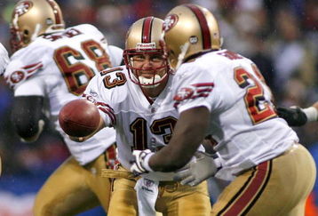 ORCHARD PARK, NY - NOVEMBER 30: Shaun Hill #13 of the San Francisco 49ers hands off to Frank Gore #21 against the Buffalo Bills   on November 30, 2008 at Ralph Wilson Stadium in Orchard Park, New York.  The 49ers won10-3.  (Photo by Rick Stewart/Getty Images)