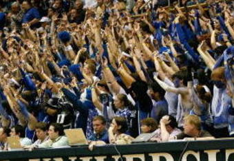 DURHAM, NC - FEBRUARY 11:  Duke Blue Devils fans hold up their hands during the game against the North Carolina Tar Heels on February 11, 2009 at Cameron Indoor Stadium in Durham, North Carolina.  (Photo by Kevin C. Cox/Getty Images)