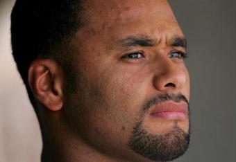 SAN FRANCISCO - MAY 16:  Johan Santana #57 of the New York Mets stands in the dugout during the seventh inning strech of their game against the San Francisco Giants at AT&T Park on May 16, 2009 in San Francisco, California.  The Mets won 9-6.  (Photo by Ezra Shaw/Getty Images)