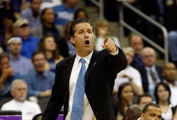 KANSAS CITY, MO - MARCH 21:  Head Coach John Calipari of the Memphis Tigers points a finger from the sideline during their second round game against the Maryland Terrapins in the NCAA Division I Men's Basketball Tournament at the Sprint Center on March 21, 2009 in Kansas City, Missouri. The Tigers defeated the Terrapins 89-70.  (Photo by Jamie Squire/Getty Images)