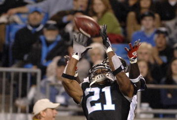 Carolina Panthers cornerback Ken Lucas intercepts an end zone pass against  the Tampa Bay Buccaneers on ESPN Monday Night Football Nov. 13, 2006 in Charlotte.  The Panthers won 24 - 10.  (Photo by Al Messerschmidt/Getty Images)