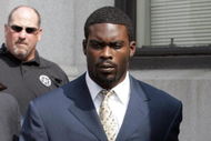 RICHMOND, VA - AUGUST 27:  Atlanta Falcons quarterback Michael Vick (R) leaves federal court August 27, 2007 in Richmond, Viriginia. Vick pleaded guilty to a federal dogfighting charge.  (Photo by Steve Helber-Pool/Getty Images)
