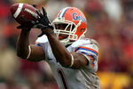 TALLAHASSEE, FL - NOVEMBER 29:  Receiver Percy Harvin #1 of the Florida Gators takes a direct snap and runs for a touchdown  against the Florida State Seminoles at Bobby Bowden Field at Doak Campbell Stadium on November 29, 2008 in Tallahassee, Florida.  The Gators defeated the Seminoles 45-15.  (Photo by Marc Serota/Getty Images)