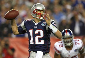 GLENDALE, AZ - FEBRUARY 03:  Quarterback Tom Brady #12 of the New England Patriots drops back to pass against the New York Giants the second half of Super Bowl XLII on February 3, 2008 at the University of Phoenix Stadium in Glendale, Arizona. The Giants defeated the Patriots 17-14.  (Photo by Donald Miralle/Getty Images)