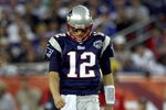 GLENDALE, AZ - FEBRUARY 03:  Quarterback Tom Brady #12 of the New England Patriots walks off the field in the second half of Super Bowl XLII against the New York Giants on February 3, 2008 at the University of Phoenix Stadium in Glendale, Arizona.  The Giants defeated the Patriots 17-14. (Photo by Donald Miralle/Getty Images)