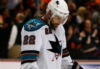 ANAHEIM, CA - APRIL 27:  Dan Boyle #22 of the San Jose Sharks stands on the ice after the Sharks were eliminated from the playoffs by the Anaheim Ducks during Game Six of the Western Conference Quarterfinal Round of the 2009 Stanley Cup Playoffs at the Honda Center on April 27, 2009 in Anaheim, California.  (Photo by Jeff Gross/Getty Images)