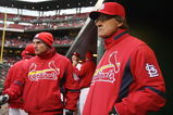 ST. LOUIS - APRIL 06:  Manager Tony LaRussa #10 of the St. Louis Cardinals looks on from the dugout against the Pittsburgh Pirates during Opening Day on April 6, 2009  at Busch Stadium in St. Louis, Missouri. The Pittsburgh Pirates defeated the St. Louis Cardinals 6-4.  (Photo by Elsa/Getty Images)