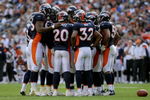 DENVER - NOVEMBER 02:  The Denver Broncos defense huddles as the face the Miami Dolphins during NFL action at Invesco Field at Mile High on November 2, 2008 in Denver, Colorado. The Dolphins defeated the Broncos 26-17.  (Photo by Doug Pensinger/Getty Images)