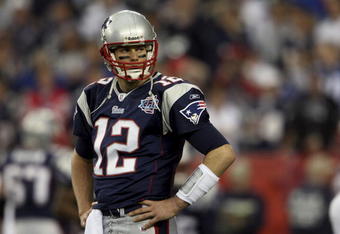 GLENDALE, AZ - FEBRUARY 03:  Quarterback Tom Brady #12 of the New England Patriots looks on during Super Bowl XLII against the New York Giants on February 3, 2008 at the University of Phoenix Stadium in Glendale, Arizona. The Giants defeated the Patriots 17-14.  (Photo by Andy Lyons/Getty Images)