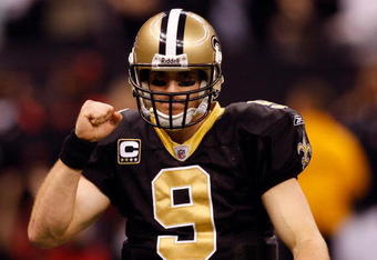 NEW ORLEANS - DECEMBER 28:  Quarterback Drew Brees #9 of the New Orleans Saints pumps his fist during the game against the Carolina Panthers on December 28, 2008 at the Superdome in New Orleans, Louisiana.  (Photo by Chris Graythen/Getty Images)