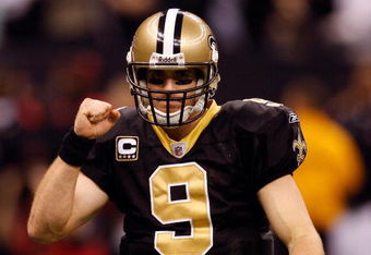 NEW ORLEANS - DECEMBER 28:  Quarterback Drew Brees #9 of the New Orleans Saints pumps his fist during the game against the Carolina Panthers on December 28, 2008 at the Superdome in New Orleans, Louisiana.  (Photo by Chris Graythen/Getty Images)