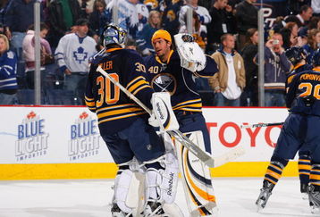 BUFFALO, NY - MARCH 27:  Patrick Lalime #40 of the Buffalo Sabres congratulates Ryan Miller #30 following the game against the Toronto Maple Leafs on March 27, 2009 at HSBC Arena in Buffalo, New York. (Photo by Rick Stewart/Getty Images)