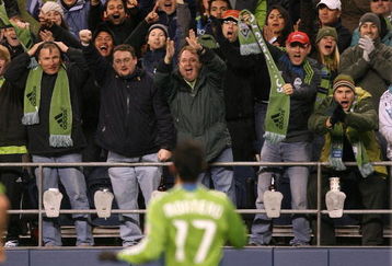 SEATTLE - MARCH 28:  Seattle Sounders FC forward Fredy Montero #17 celebrates with fans after scoring the second goal against Real Salt Lake on March 28, 2009 at Qwest Field in Seattle, Washington. The Sounders defeated Real Salt Lake 2-0. (Photo by Otto Greule Jr/Getty Images)