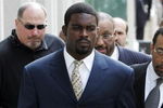 RICHMOND, VA - AUGUST 27:  Atlanta Falcons quarterback Michael Vick (R) arrives at federal court with attorney Billy Martin (R) August 27, 2007 in Richmond, Viriginia. Vick pleaded guilty to a federal dogfighting charge.  (Photo by Steve Helber-Pool/Getty Images)