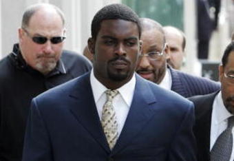 RICHMOND, VA - AUGUST 27:  Atlanta Falcons quarterback Michael Vick (R) arrives at federal court with attorney Billy Martin (R) August 27, 2007 in Richmond, Viriginia. Vick pleaded guilty to a federal dogfighting charge.  (Photo by Steve Helber-Pool/Getty Images)