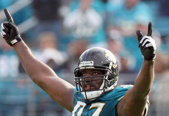 JACKSONVILLE, FL - DECEMBER 14:  Reggie Hayward #97 of the Jacksonville Jaguars celebrates following the game against the Green Bay Packers at Jacksonville Municipal stadium on December 14, 2008 in Jacksonville, Florida.  (Photo by Sam Greenwood/Getty Images)