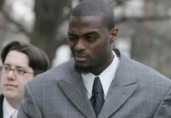 LEBANON - JANUARY 14: New York Giants wide receiver Plaxico Burress winks at a supporter as he arrives at the Lebanon County Courthouse January 14, 2009 in Lebanon, Pa.  Burress is scheduled to appear in a civil trial in a dispute with an automobile dealer over what he owes in damages to a vehicle supplied to him by the dealership. (Photo by Chris Gardner/Getty Images)