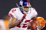 CLEVELAND - OCTOBER 13:  Steve Smith #12 of the New York Giants carries the ball during the game against the Cleveland Browns on October 13, 2008 at Cleveland Browns Stadium in Cleveland, Ohio. (Photo by: Gregory Shamus/Getty Images)