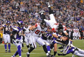 MINNEAPOLIS - DECEMBER 21: Matt Ryan #2 of the Atlanta Falcons dives into the endzone during an NFL game against the Minnesota Vikings at the Hubert H. Humphrey Metrodome, on December 21, 2008 in Minneapolis, Minnesota.  (Photo by Tom Dahlin/Getty Images)