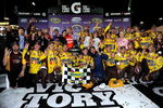 RICHMOND, VA - MAY 02:  Kyle Busch, driver of the #18 Combos Toyota, celebrates in victory lane with his crew after winning the NASCAR Sprint Cup Series Crown Royal Presents the Russ Friedman 400 at Richmond International Raceway on May 2, 2009 in Richmond, Virginia.  (Photo by Rusty Jarrett/Getty Images for NASCAR)