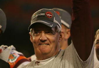 MIAMI - JANUARY 01:  Head coach Frank Beamer of the Virginia Tech Hokies celebrates after defeating the Cincinnati Bearcats to win the FedEx Orange Bowl at Dolphin Stadium on January 1, 2009 in Miami, Florida.  (Photo by Marc Serota/Getty Images)