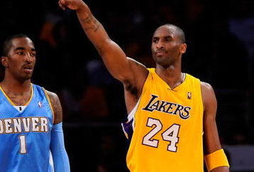LOS ANGELES, CA - MAY 19:  Kobe Bryant #24 of the Los Angeles Lakers points as he stands with J.R. Smith #1 of the Denver Nuggets in the second half of Game One of the Western Conference Finals during the 2009 NBA Playoffs at Staples Center on May 19, 2009 in Los Angeles, California. NOTE TO USER: User expressly acknowledges and agrees that, by downloading and or using this photograph, User is consenting to the terms and conditions of the Getty Images License Agreement.  (Photo by Kevork Djansezian/Getty Images)