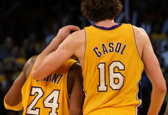 LOS ANGELES, CA - MAY 19:  (R-L) Pau Gasol #16 and Kobe Bryant #24 of the Los Angeles Lakers walk to the bench late in the fourth quarter against the Denver Nuggets in Game One of the Western Conference Finals during the 2009 NBA Playoffs at Staples Center on May 19, 2009 in Los Angeles, California. The Lakers defeated the Nuggets 105-103. NOTE TO USER: User expressly acknowledges and agrees that, by downloading and or using this photograph, User is consenting to the terms and conditions of the Getty Images License Agreement.  (Photo by Stephen Dunn/Getty Images)