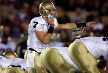 LOS ANGELES, CA - NOVEMBER 29:  Jimmy Clausen #7 of the Notre Dame Fighting Irish calls a play against the USC Trojans during the game at the Coliseum on November 29, 2008 in Los Angeles, California.  (Photo by Harry How/Getty Images)