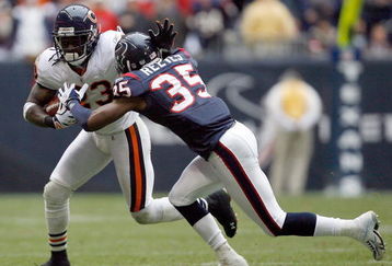 HOUSTON - DECEMBER 28:  Devin Hester #23 of the Chicago Bears runs after a catch against Jacques Reeves #35 of the Houston Texans during the second half at the Reliant Stadium on December 28, 2008 in Houston, Texas.  The Texans won 31-24.  (Photo by Harry How/Getty Images)
