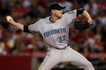 ANAHEIM, CA - MAY 6:  Roy Halladay #32 of the Toronto Blue Jays throws a pitch against the Los Angeles Angels of Anaheim at Angel Stadium May 6, 2009 in Anaheim, California.  (Photo by Stephen Dunn/Getty Images)