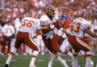 SAN DIEGO - JANUARY 31:  Quarterback Doug Williams #17 of the Washington Redskins drops back to pass during Super Bowl XXII against the Denver Broncos at Jack Murphy Stadium on January 31, 1988 in San Diego, California.  The Redskins won 42-10.  (Photo by Rick Stewart/Getty Images)