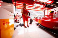 BARCELONA, SPAIN - MAY 08:  Kimi Raikkonen of Finland and Ferrari exits his team garage during practice for the Spanish Formula One Grand Prix at the Circuit de Catalunya on May 8, 2009 in Barcelona, Spain.  (Photo by Mark Thompson/Getty Images)
