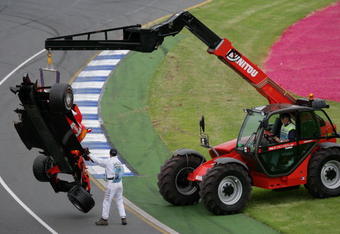 MELBOURNE, AUSTRALIA - APRIL 02:  The badly damaged Ferrari of Felipe Massa of Brazil is taken away after crashing at the start of the Australian Formula One Grand Prix at the Albert Park Circuit on April 02, 2006 in Melbourne, Australia.  (Photo by Mark Thompson/Getty Images)