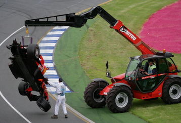 MELBOURNE, AUSTRALIA - APRIL 02:  The badly damaged Ferrari of Felipe Massa of Brazil is taken away after crashing at the start of the Australian Formula One Grand Prix at the Albert Park Circuit on April 02, 2006 in Melbourne, Australia.  (Photo by Mark Thompson/Getty Images)