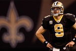 NEW ORLEANS - DECEMBER 28:  Quarterback Drew Brees #9 of the New Orleans Saints waits during a timeout against the Carolina Panthers 33-31 on December 28, 2008 at the Superdome in New Orleans, Louisiana.  (Photo by Chris Graythen/Getty Images)