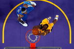 LOS ANGELES, CA - MAY 19:  Kobe Bryant #24 of the Los Angeles Lakers dunks the ball in front of Carmelo Anthony #15 of the Denver Nuggets in Game One of the Western Conference Finals during the 2009 NBA Playoffs at Staples Center on May 19, 2009 in Los Angeles, California. The Lakers defeated the Nuggets 105-103. NOTE TO USER: User expressly acknowledges and agrees that, by downloading and or using this photograph, User is consenting to the terms and conditions of the Getty Images License Agreement.  (Photo by Kevork Djansezian/Getty Images)