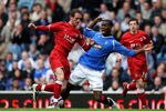 GLASGOW, SCOTLAND - MAY 16: Maurice Edu of Rangers is tackled by Mark Kerr of Aberdeen during the Scottish Premier League match between Rangers and Aberdeen at Ibrox Stadium on May 16, 2009 in Glasgow, Scotland.  (Photo by Jeff J Mitchell/Getty Images)