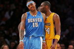 LOS ANGELES - APRIL 3:  Carmello Anthony #15 (L) of the Denver Nuggets and Kobe Bryant #24 of the Los Angeles Lakers joke around during the game at Staples Center April 3, 2007 in Los Angeles, California.  NOTE TO USER: User expressly acknowledges and agrees that, by downloading and/or using this Photograph, user is consenting to the terms and conditions of the Getty Images License Agreement.  (Photo by Lisa Blumenfeld/Getty Images)
