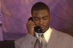 21 Apr 2001:  Michael Vick speaks to representatives from the Atlanta Falcons before the Falcons selected Vick first in the NFL Draft at Madison Square Garden in New York City. Mandatory Credit: Ezra Shaw/ALLSPORT