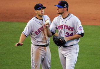 SAN FRANCISCO - MAY 17:  David Wright #5 speaks to Mike Pelfrey #34 of the New York Mets after two runners got on base in the sixth inning of their game against the San Francisco Giants during their game at AT&T Park on May 17, 2009 in San Francisco, California.  (Photo by Ezra Shaw/Getty Images)