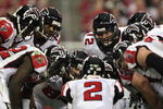 GLENDALE, AZ - JANUARY 03:   The Atlanta Falcons huddle around quarterback Matt Ryan #2 in the NFC Wild Card Game against the Arizona Cardinals on January 3, 2009 at University of Phoenix Stadium in Glendale, Arizona. The Cardinals defeated the Falcons 30-24.  (Photo by Jed Jacobsohn/Getty Images)
