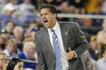 GLENDALE, AZ - MARCH 26:  Head Coach John Calipari of the Memphis Tigers adjusts his team against the Missouri Tigers in the Sweet 16 of the NCAA Division I Men's Basketball Tournament at the University of Phoenix Stadium on March 26, 2009 in Glendale, Arizona.  (Photo by Ronald Martinez/Getty Images)