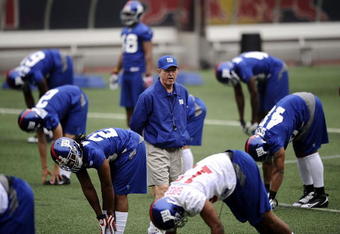 EAST RUTHERFORD, NJ - MAY 09: Tom Coughlin, head coach of the New York Giants walks on the field at rookie camp on May 9, 2009 in East Rutherford, New Jersey.  (Photo by Jeff Zelevansky/Getty Images)