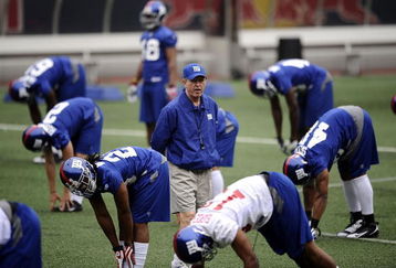 EAST RUTHERFORD, NJ - MAY 09: Tom Coughlin, head coach of the New York Giants walks on the field at rookie camp on May 9, 2009 in East Rutherford, New Jersey.  (Photo by Jeff Zelevansky/Getty Images)