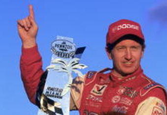 11 Nov 2001:  Driver Bill Elliott #9 holds the winning trophy after the Pennzoil Freedom 400, part of the NASCAR Winston Cup Championship Series at Homestead-Miami Speedway in Homestead, Florida.  Elliott won the pole and held on to win the race.  Mandatory Credit:  Jon Ferrey/Allsport