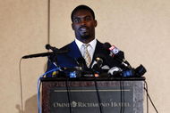 RICHMOND, VA - AUGUST 27: Atlanta Falcons quarterback Michael Vick speaks to reporters at the Omni Richmond Hotel after agreeing to a guilty plea on charges stemming from his involvement in a dogfighting ring August 27, 2007, in Richmond, Virginia. (Photo by Jonathan Ernst/Getty Images)