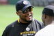 PITTSBURGH - MAY 01:  Head coach Mike Tomlin of the Pittsburgh Steelers talks with Santonio Holmes #10 during rookie training at the Pittsburgh Steelers Practice Facility on May 1, 2009 in Pittsburgh, Pennsylvania.  (Photo by Joe Sargent/Getty Images)