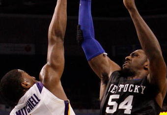 TAMPA, FL - MARCH 13:  Patrick Patterson #54 of the Kentucky Wildcats makes a shot over Tasmin Mitchell #1 of the Louisiana State University Tigers during the second round of the SEC Men's Basketball Tournament on March 13, 2009 at The St. Pete Times Forum in Tampa, Florida.  (Photo by Chris Graythen/Getty Images)