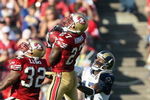SAN FRANCISCO - NOVEMBER 16:  Walt Harris #27 of the San Francisco 49ers intercepts a pass as Michael Lewis #32 and Donnie Avery #17 of the St. Louis Rams look on during the game on November 16, 2008 at Candlestick Park in San Francisco, California. (Photo by Jed Jacobsohn/Getty Images)